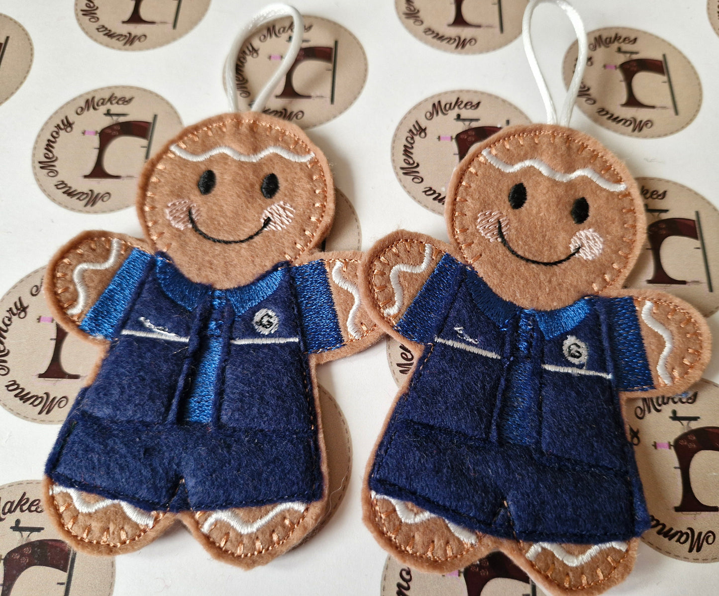 Shopworker blue uniform , gingerbread Christmas decoration